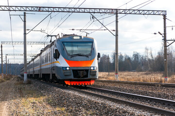 the train arrives at the platform. passenger train.
