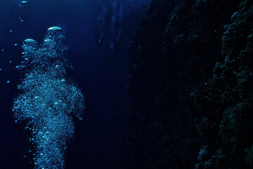 Fototapeta na wymiar bubbles under water diving background