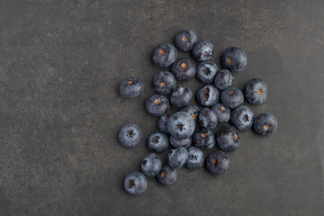fresh blueberries on black background