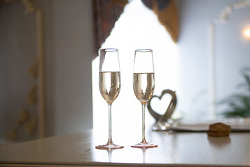wedding glasses with champagne wine in the registry office