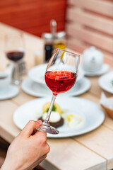  The girl in the restaurant with wine