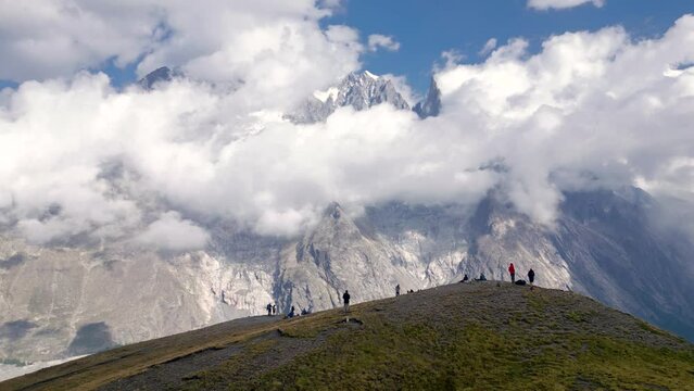 Dramatic Aerial Drone revealing Mont Blanc from the Italian side in Tour du Mont Blanc hike flying in reverse, Alps, Italy