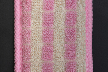 pink cotton cord for washing the body in the bathroom