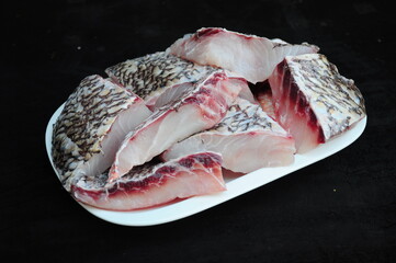Raw Fish Meat on White Plate