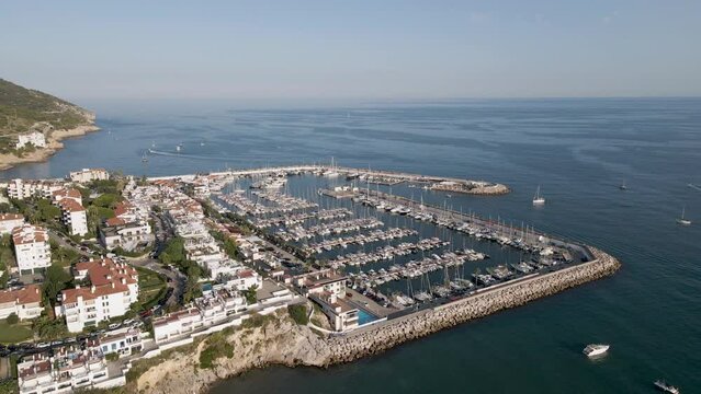 Aerial panoramic view of Sitges harbor, Barcelona, Sitges. Yachts and saling