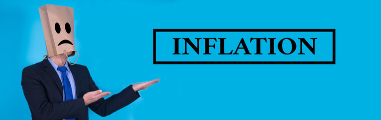 businessman with inflation concept with background