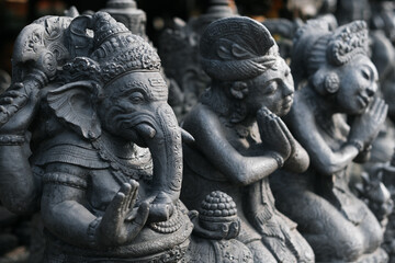 Fototapeta na wymiar Hindu god statues in Bali market.