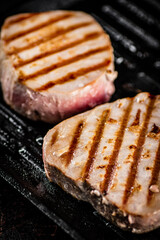 Tuna steak in a grill pan. 