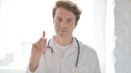 Denying Young Doctor Rejecting with Hand Gesture