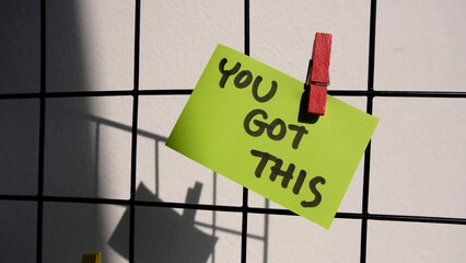 You got this! Handwriting on sticky note, Business concept.