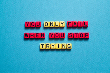 You only fail when you stop trying - word concept on cubes, text