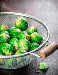 Brussels sprouts in a colander. 