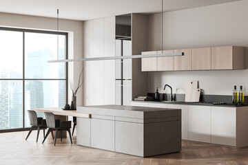 Light kitchen interior with bar countertop and cooking area with panoramic window