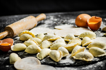 Cooking homemade dumplings with potatoes. 