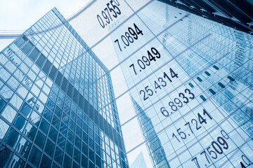 Stock market changes, business chart with numbers. Double exposure with building skyscrapers in London City financial. Concept of forex and online trading. Finance and investment fluctuation