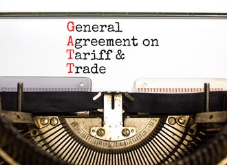 GATT symbol. Concept words GATT general agreement on tariff and trade typed on retro typewriter on beautiful white background. Business GATT general agreement on tariff and trade concept. Copy space.