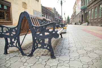 Fototapeta na wymiar Bench in the city. Gyumri. Armenia