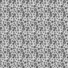 Vector monochrome seamless doodle pattern with hand drawn black thick circles and dots. For printing, packaging, text, wallpaper, children's design, scrapbooking