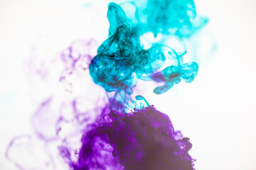 Blue and purple dye in water