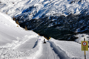 five km sledding run from Hannig  to Saas-Fee with spectacular views along the way, Saas-Fee, Valais, Wallis, Switzerland, Europe