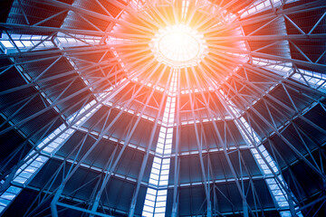 Background of curved blue glass dome ceiling with geometric structure