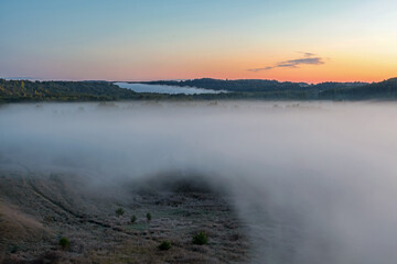 Foggy dawn in Izborsko-Malskaya Valley, Pskov region