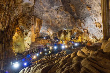 Scenic wooden walkway inside Thien Duong or Paradise Cave