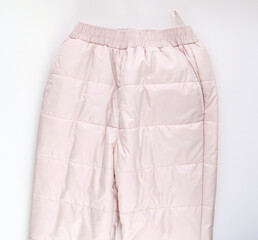 insulated winter pink pants on a white background. 