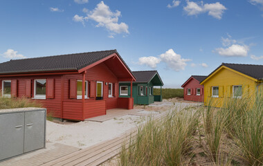 Obraz premium Beautiful and colorful wooden houses on the beach of the island Heligoland - Dune.