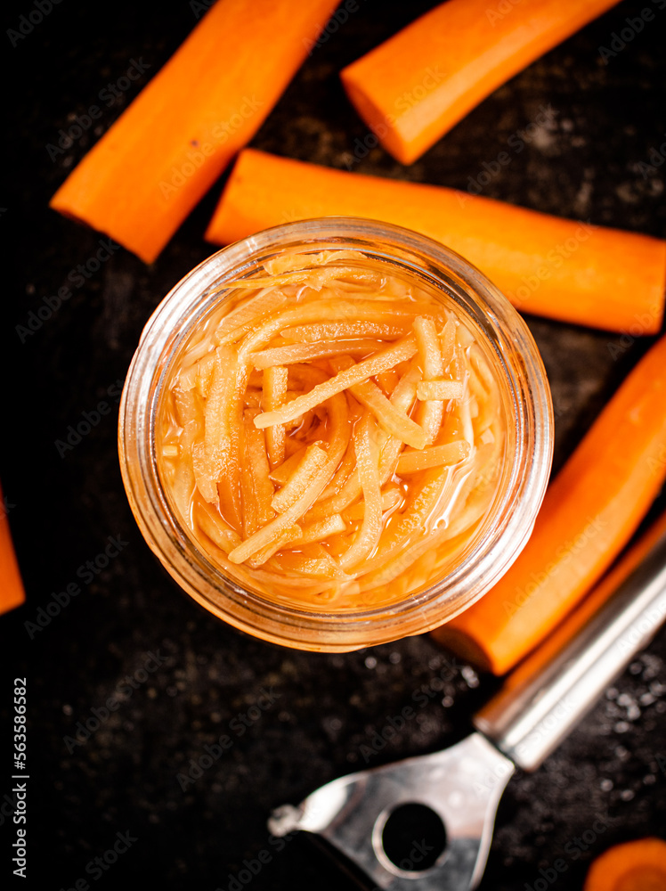 Canvas Prints Canned carrots in a glass jar. 