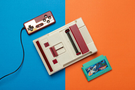 8-Bit Game Console With Gamepad and cartridge
