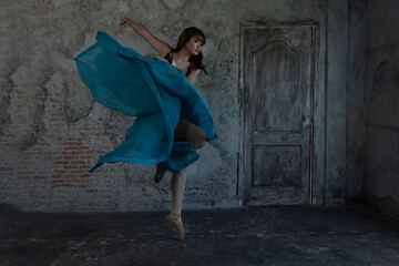 woman dancing. woman dancing in the studio. young ballerina with a perfect body is dancing in a photo studio, dancers are dressed in fashionable outfits.  © ENGINEER - STUDIO