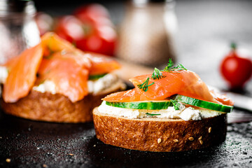 A flavorful salmon sandwich on the table. 