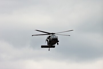 Fototapeta na wymiar Army Black Hawk Helicopter in flight