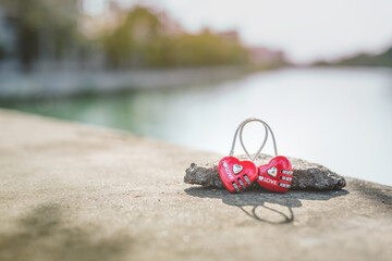 love valentine concept, master key heart shape with lake background