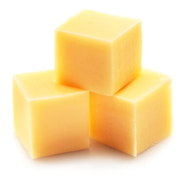 Pyramid of cheese cubes isolated on white background.