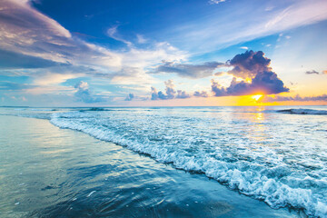 Beach sunset over the tropical sea