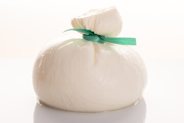 Burrata - Italian cheese, which is an excellent combination of mozzarella and cream on white...