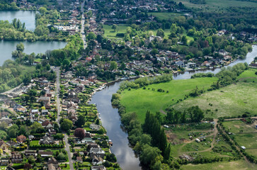 Fototapeta na wymiar Riverside homes at Sunnymeads, Berkshire - aerial view