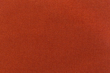 The red cloth color texture as background.