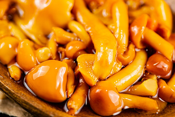 Pickled mushroom. Macro background. The texture of mushrooms.