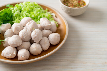 pork meatball with vegetable and spicy sauce