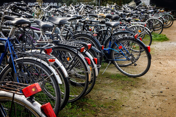 Many bicycles on the parking.