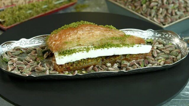 Traditional turkish baklava pistachio pastry. Dilberdudagi, ozel kesim baklava, cikolatali baklava, fistikli baklava, katmer, fistikli kadayif, kattafi, fistik sarma, soguk baklava, midye baklava, cev