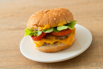 pork burger with cheese on plate
