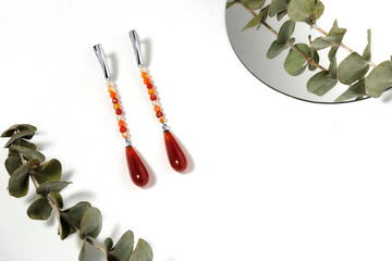 Elegant jewelry set. Jewellery set with gemstones. Jewelry accessories collage. Product still life...