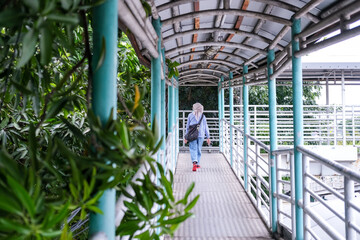 The pedestrian bridge is very useful for pedestrians, a shady pedestrian bridge in Jakarta