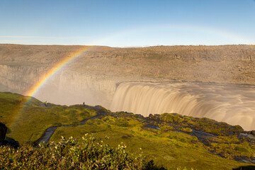 View of Gullfoss in Iceland and a rainbow in the foreground