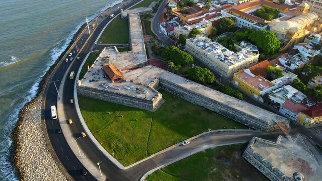 Aerial shot drone orbiting baluarte de Santo Domingo an Cafe del Mar
