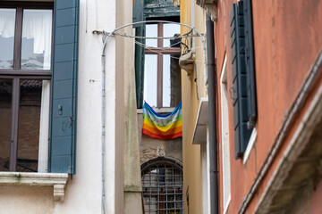 Cityscape of gay flag on building in Venice. Italy